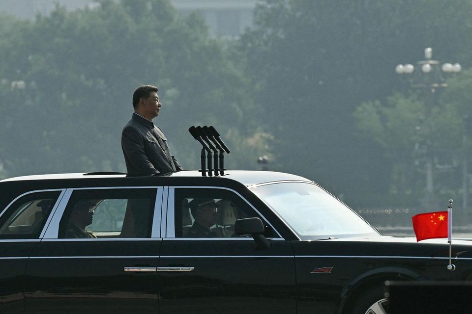 China’s President Xi Jinping starts his inspection of the troops during a military parade in Beijing’s Tiananmen Square on Sept 3. PHOTO: AFP