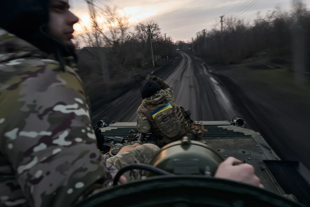 Ukrainian soldiers on their way into the city. Photo: Vlada Liberova for Getty Images.